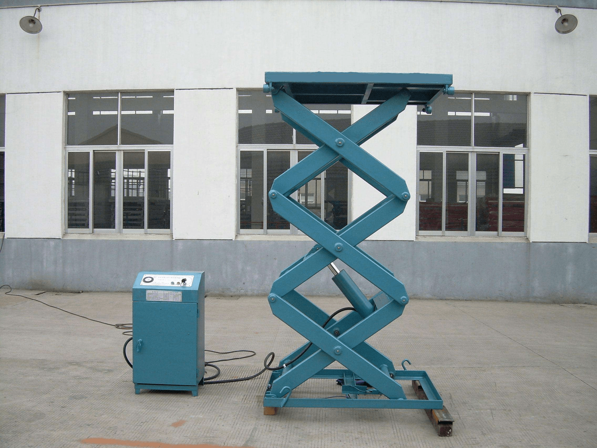 Electric stationary scissor lift 1 1